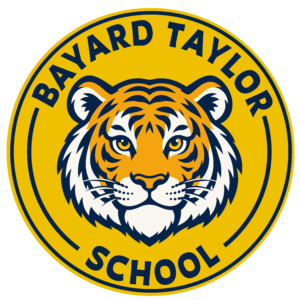 Bayard-Taylor-Logo_Full Bayard Taylor School logo featuring a blue, gold and white tiger head inside a circular gold badge.